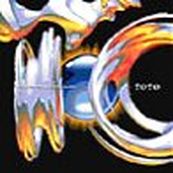 Toto - THROUGH THE LOOKING GLASS