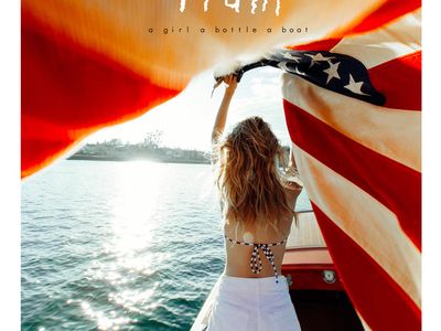 A GIRL A BOTTLE A BOAT Train