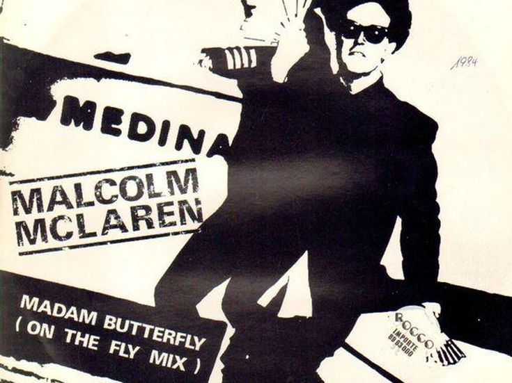 Paul Cook (Sex Pistols) e Bob Geldof  cantano al funerale di Malcolm McLaren