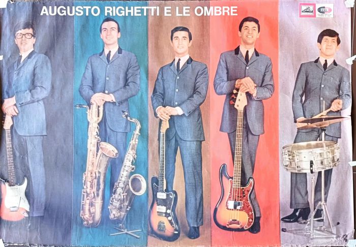 https://images.rockol.it/Wy0oADzkQpqbZcFipBfnEJLBTnw=/700x0/smart/rockol-img/img/foto/upload/augusto-ombre-poster-tibaldi-con-fender-precision.jpg